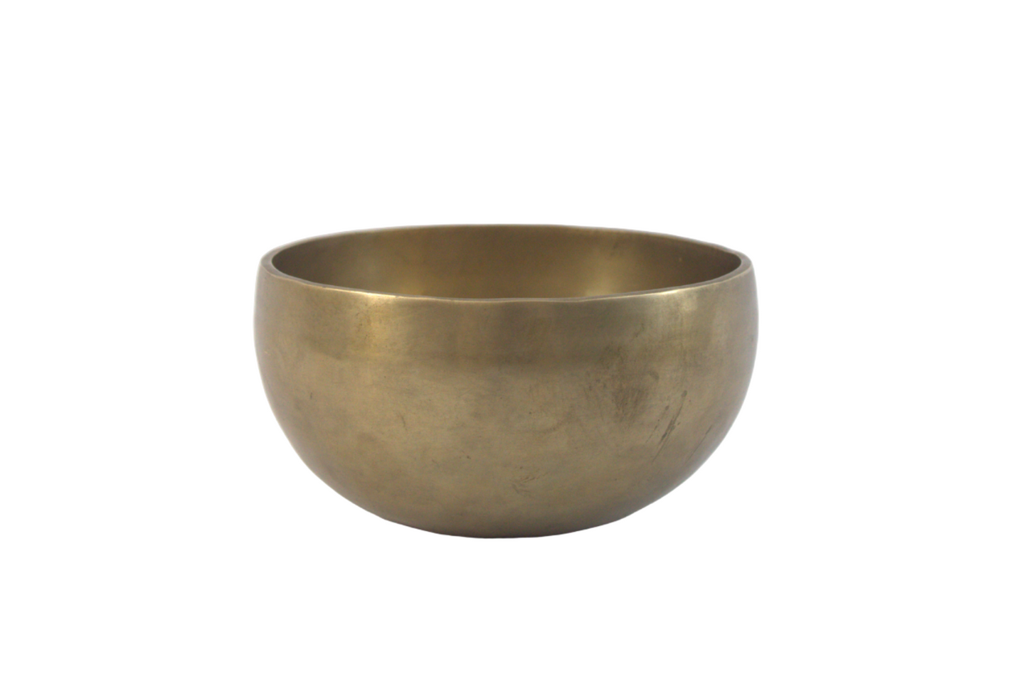 Brass singing bowl on a white background