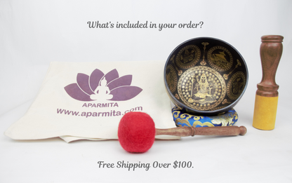 Tibetan singing bowl set with mallet and Aparmita branded mat on a white background