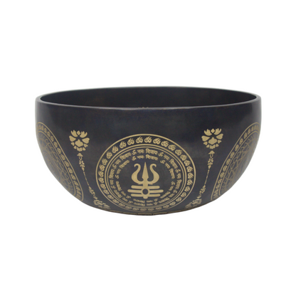 Black bowl with gold decorative patterns on a white background