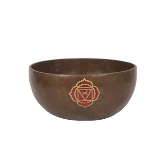 Bronze singing bowl with a red emblem on a white background