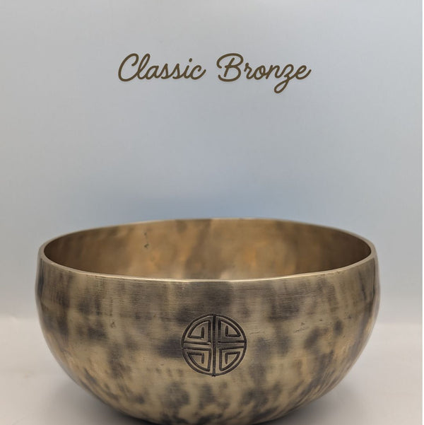 Bronze singing bowl with 'Classic Bronze' text on a light gray background