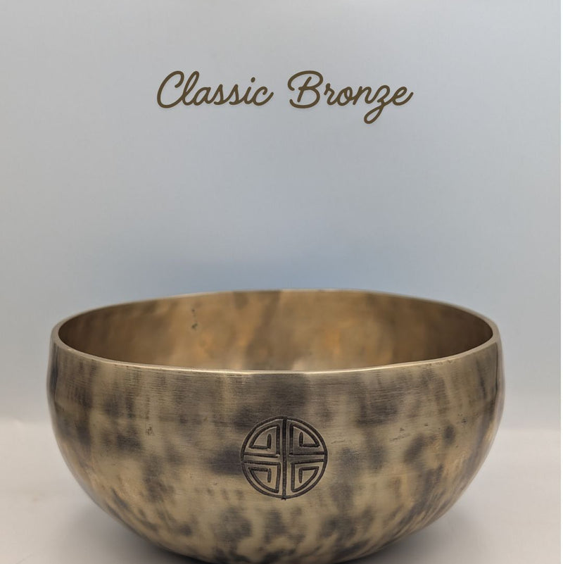 Bronze singing bowl with 'Classic Bronze' text on a light gray background