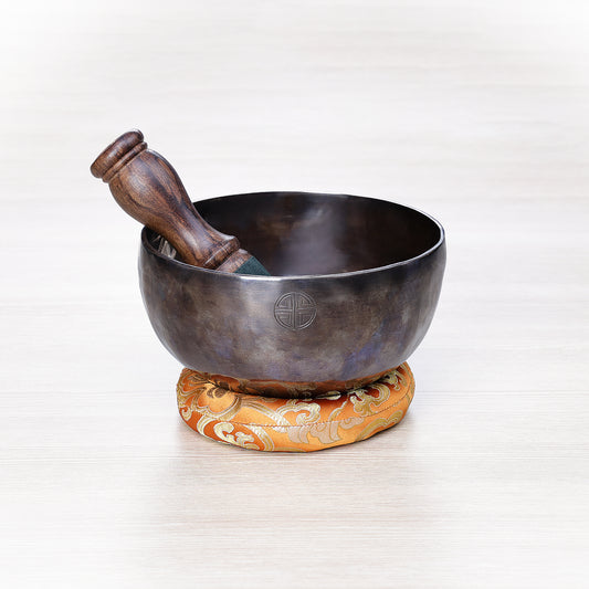 Dark Chocolate Full Moon singing bowl set with rosewood striker and orange brocade cushion made by Nepali artisans
