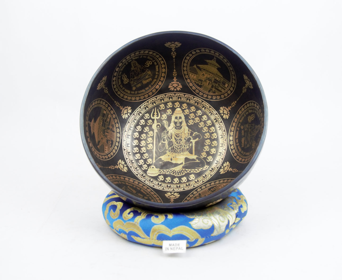 Decorative black bowl with gold designs on a white background