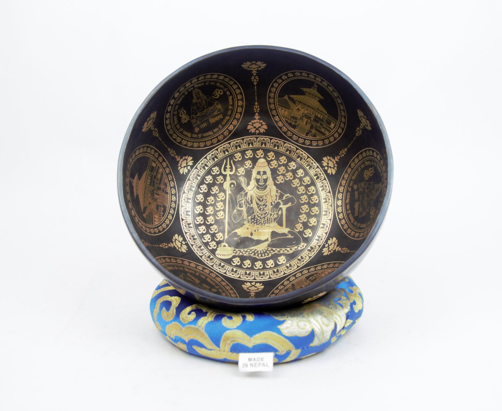 Decorative black bowl with gold designs on a white background