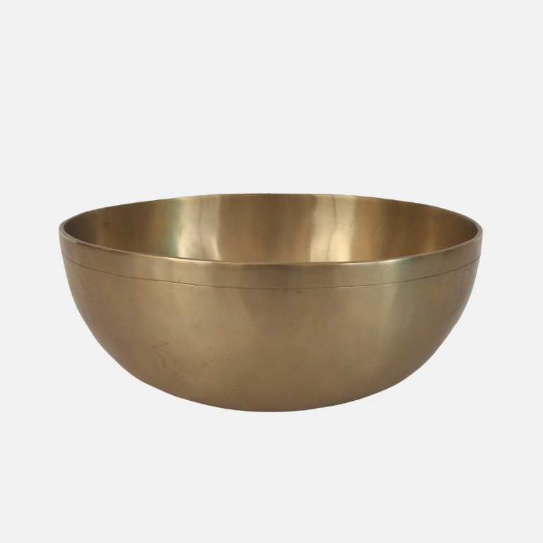 Brass bowl on a white background