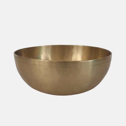 Brass bowl on a white background