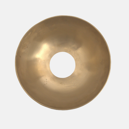 Gold bowl with a central hole on a white background