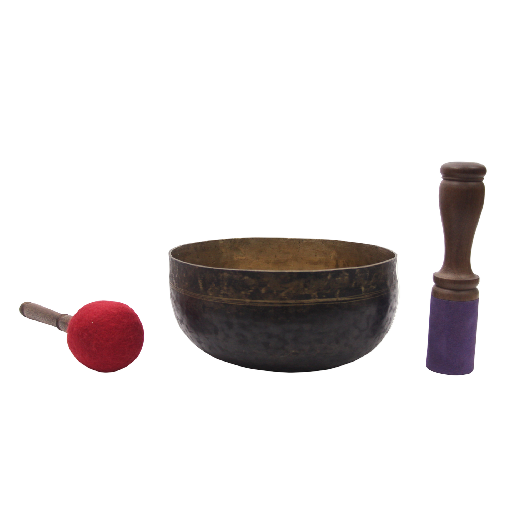 Tibetan singing bowl set with a mallet on a white background